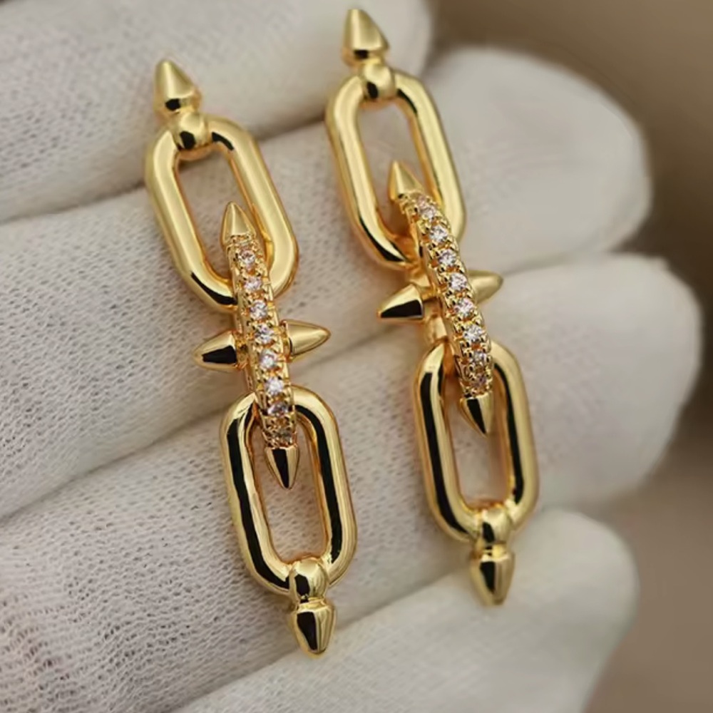 Gold Titan Earrings - Picture 2 of 7